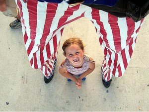 Child and a Stiltwalker